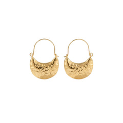A pair of gold crescent-shaped hoop earrings with a hammered texture, displayed on a clean white background.