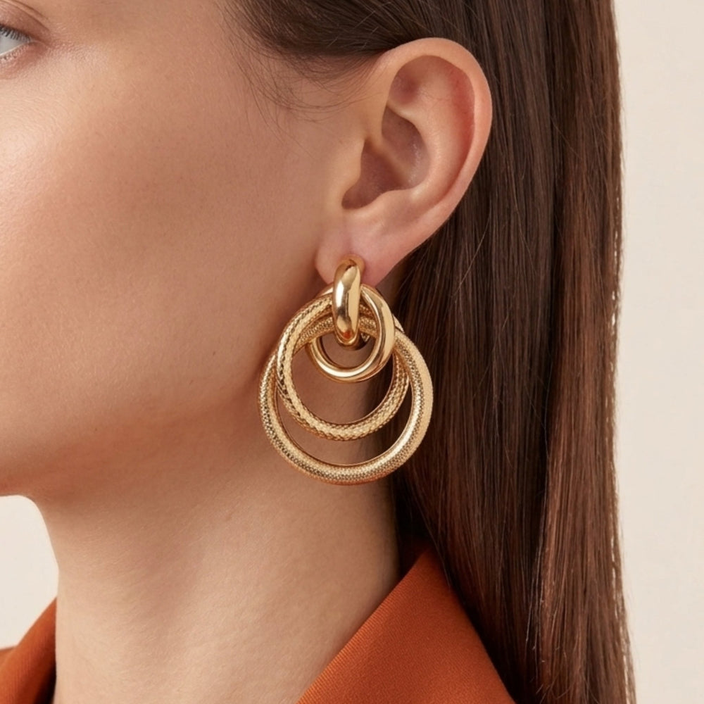 Textured gold triple interlock drop earrings with multi-hoops, designed for women, by Sajna Sawarnaa, featuring anti-tarnish Korean jewelry style.