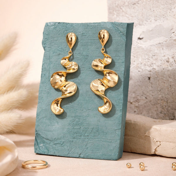 Long sculptural molten wave ribbon drop earrings in silver and gold – anti-tarnish Korean jewellery by Sajna Sawarnaa
