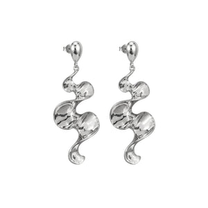 Long sculptural molten wave ribbon drop earrings in silver and gold – anti-tarnish Korean jewellery by Sajna Sawarnaa
