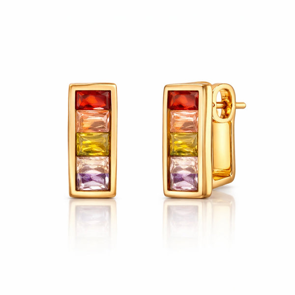 Woman wearing rainbow crystal gold huggie earrings with colorful prism stones and modern Korean luxury design