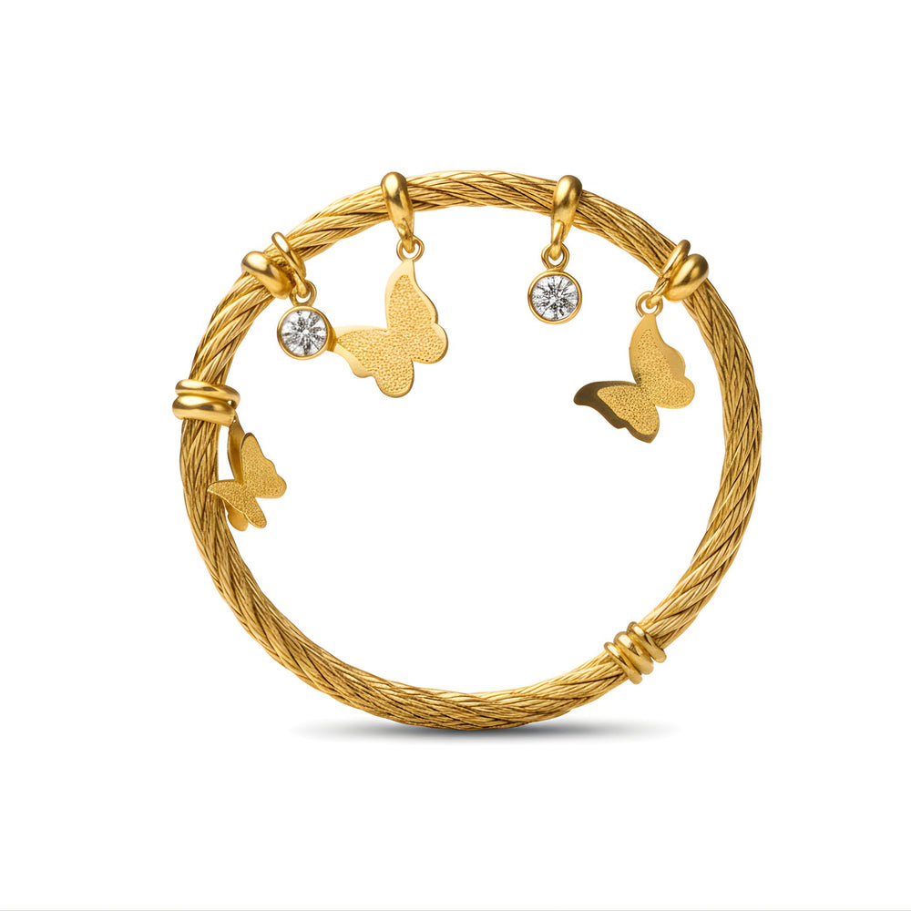 Gold butterfly charm bracelet for women by Sajna Sawarnaa, elegant designer bangle with intricate butterfly detail.