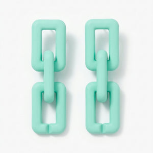 Pastel mint green geometric chain-link statement earrings with modern Korean-inspired minimal aesthetic jewelry design