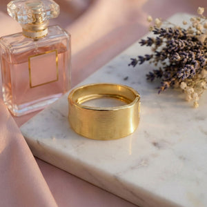 Elegant gold cuff bracelet by Sajna Sawarnaa featuring a bold statement design and anti-tarnish finish.