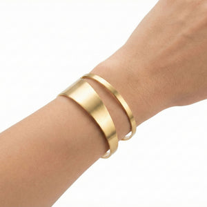 Elegant gold cuff bracelet for women by Sajna Sawarnaa featuring a double layer design, perfect for everyday luxury jewelry.