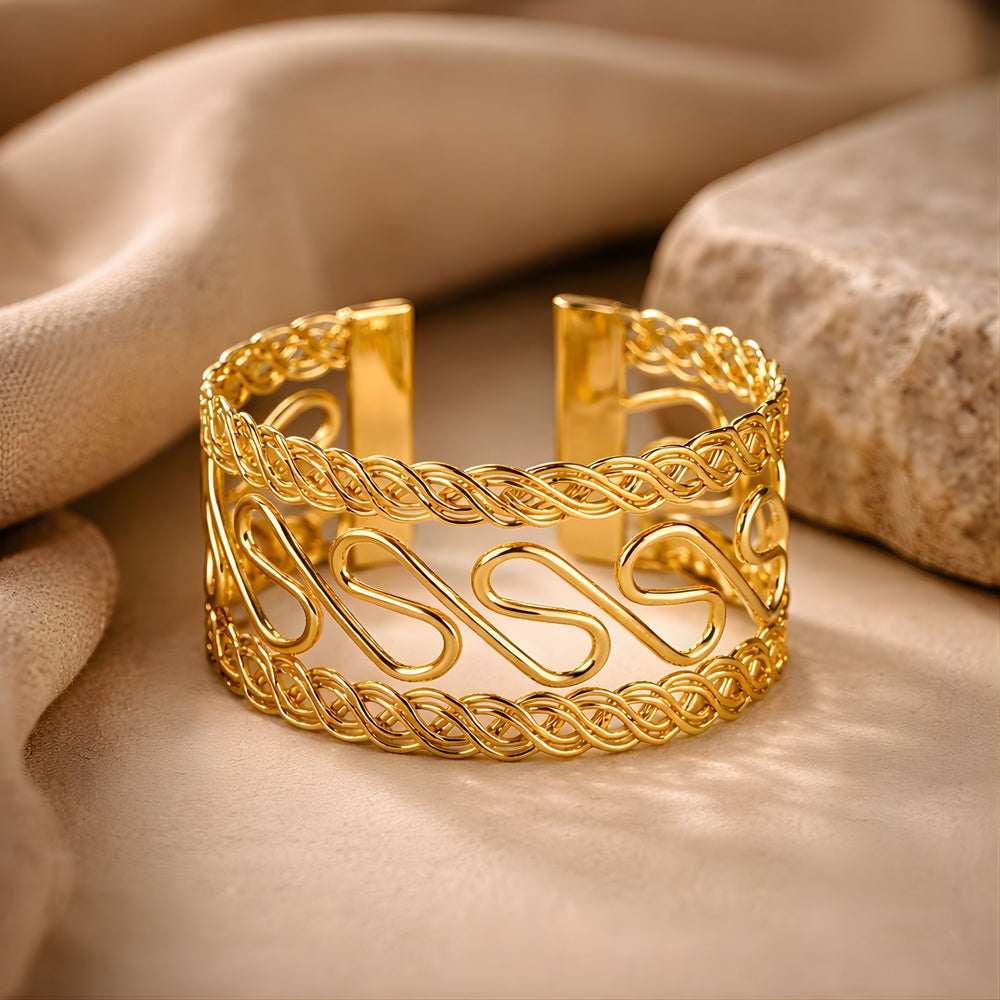 Elegant gold cuff bracelet for women by Sajna Sawarnaa, featuring a handcrafted design perfect for party wear jewelry.