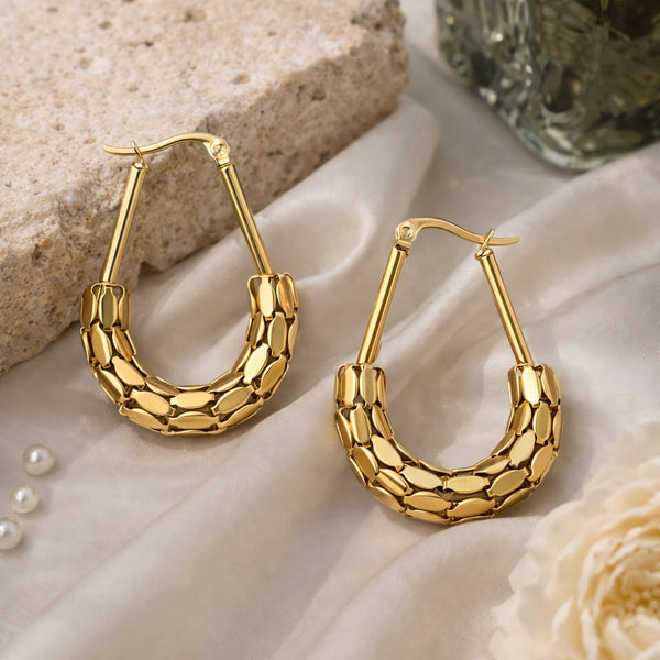 Multi-row pebble gold teardrop hoop earrings for women by Sajna Sawarnaa, featuring textured scale design and anti-tarnish finish.