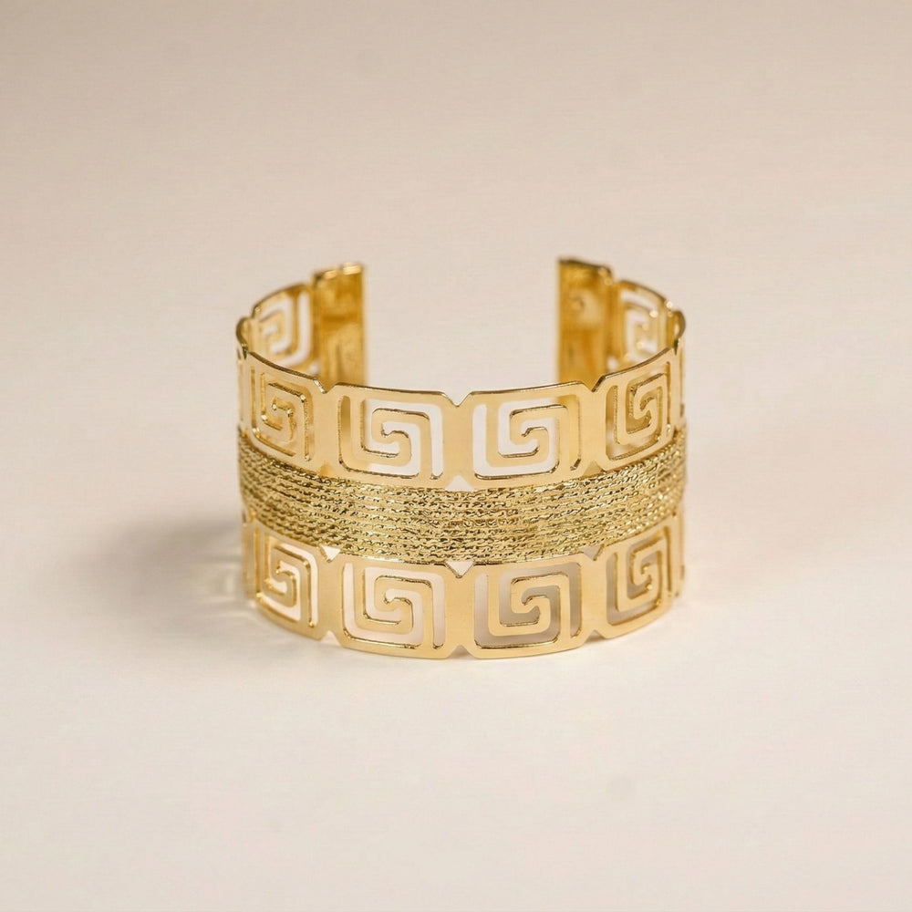 Royal gold women’s cuff bracelet with Greek patterned wide kada design, premium party jewelry by Sajna Sawarnaa.