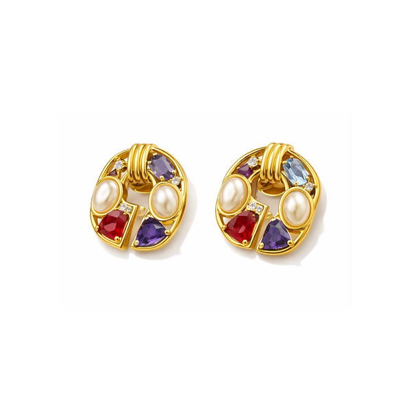 Front view of chunky gold stud earrings featuring pearls, red, purple, and blue stones isolated on a white background.