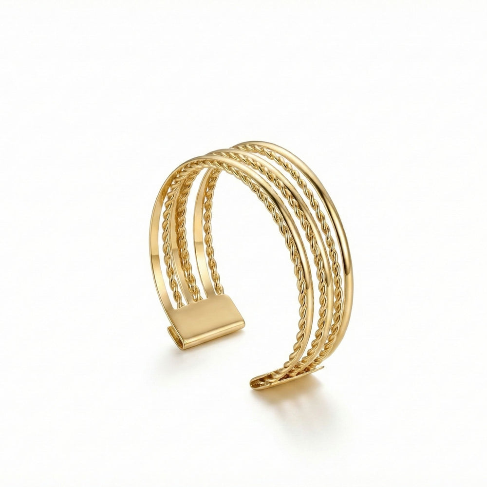 Gold layered cuff bracelet for women by SAJNA SAWARNAA, featuring a stylish multi-line open kada design.