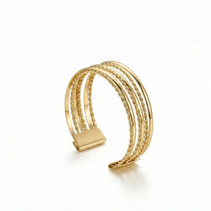 Gold layered cuff bracelet for women by SAJNA SAWARNAA, featuring a stylish multi-line open kada design.