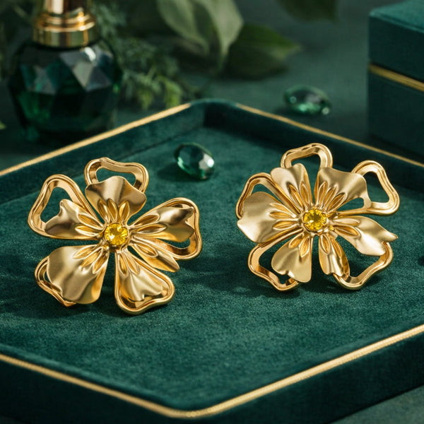 18K gold plated bold floral statement earrings for women by SAJNA SAWARNAA, featuring intricate floral design and vibrant gold finish.