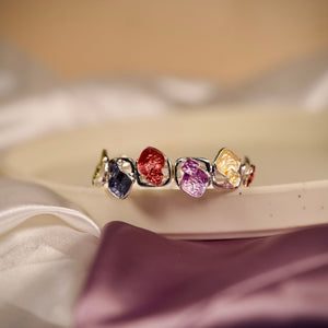 Colorful stone designer women's bracelet by Sajna Sawarnaa featuring an artistic multi-color open cuff design.