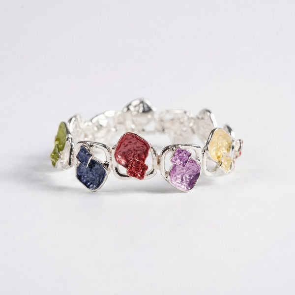 Colorful stone designer women's bracelet by Sajna Sawarnaa featuring an open cuff with vibrant multi-color stones.