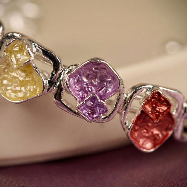 Colorful stone designer women's bracelet by Sajna Sawarnaa featuring an artistic multi-color open cuff design.