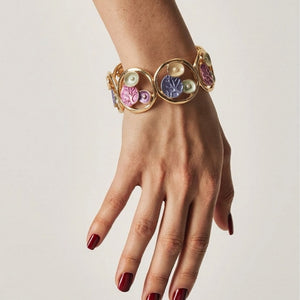 Gold floral enamel circle bracelet by SAJNA SAWARNAA featuring Korean anti-tarnish jewelry design