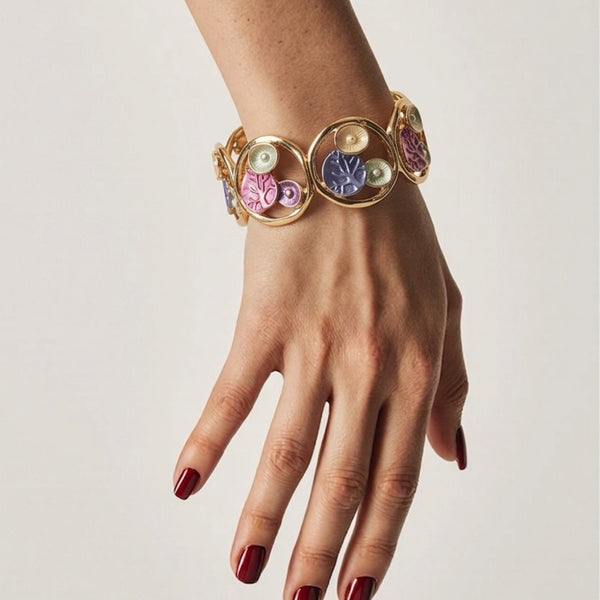 Gold floral enamel circle bracelet by SAJNA SAWARNAA featuring Korean anti-tarnish jewelry design
