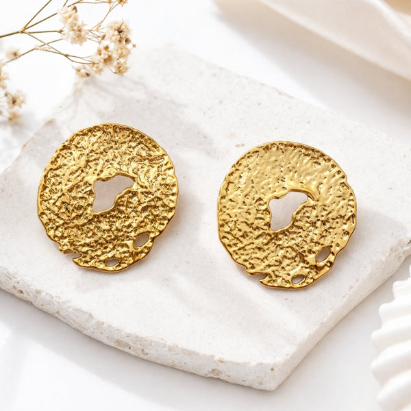 Hammered molten gold disc stud earrings for women by Sajna Sawarnaa, featuring organic textured round design and anti-tarnish finish.