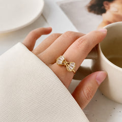 Crystal bow gold statement ring - worn lifestyle view