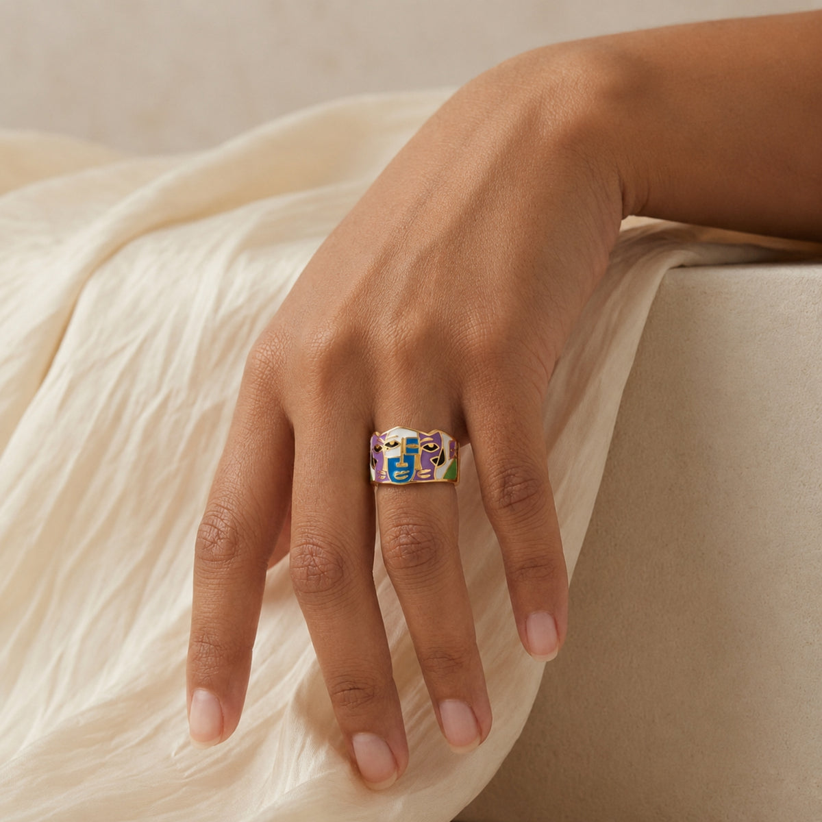 Colorful abstract face art open ring styled on hand - lifestyle view