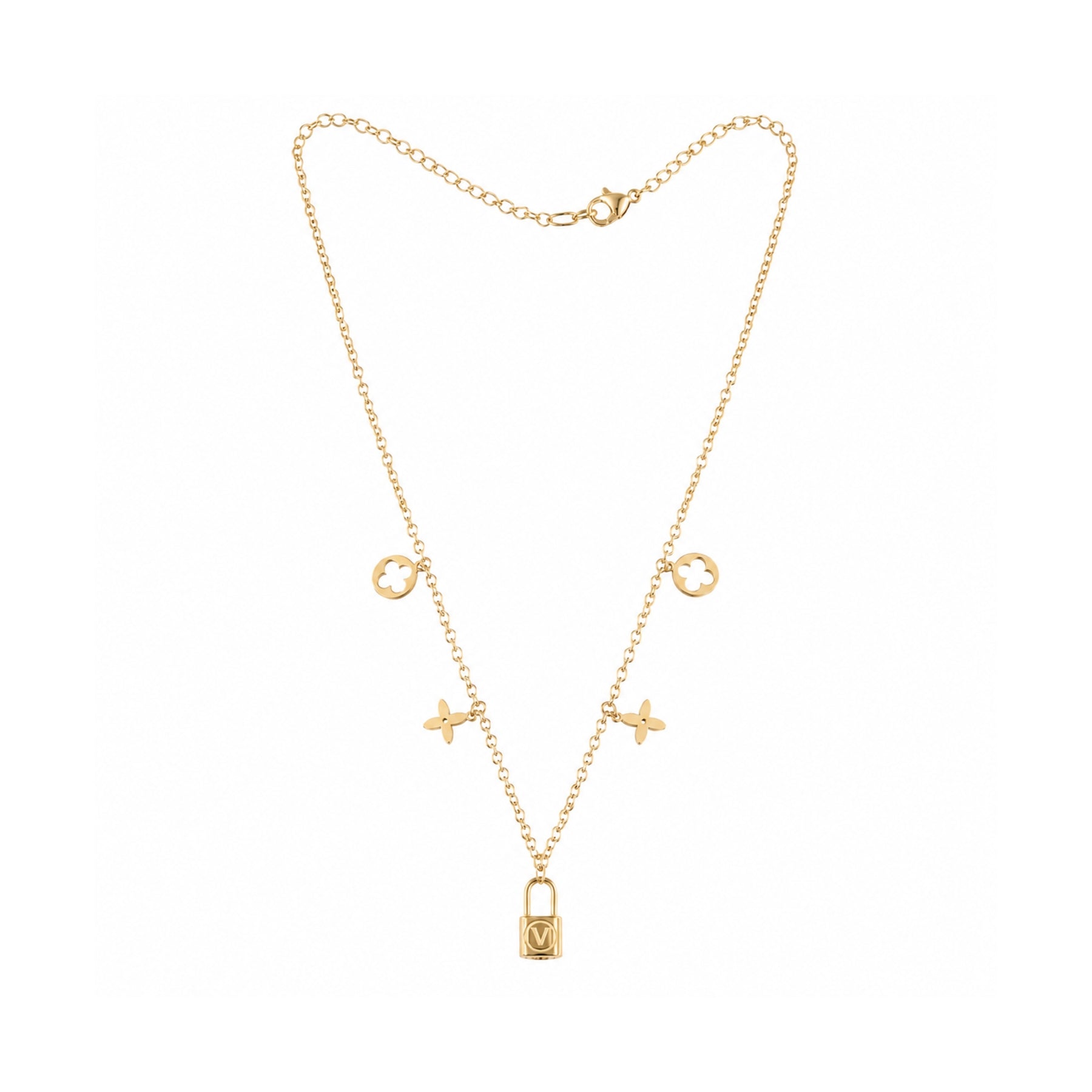 Gold clover and lock charm necklace on white background