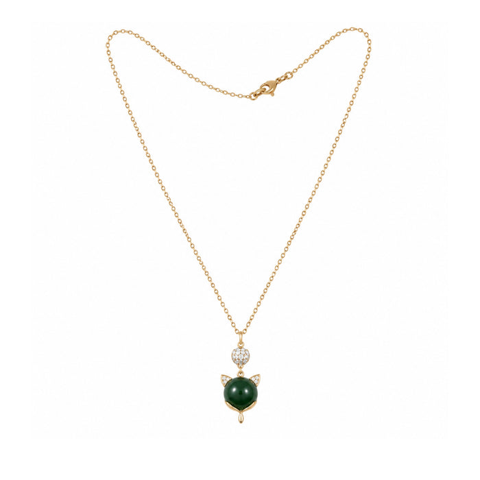 Gold-tone green cat charm necklace on a white background