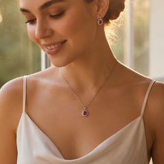 Woman wearing a silver-tone pink stone-accent pendant necklace