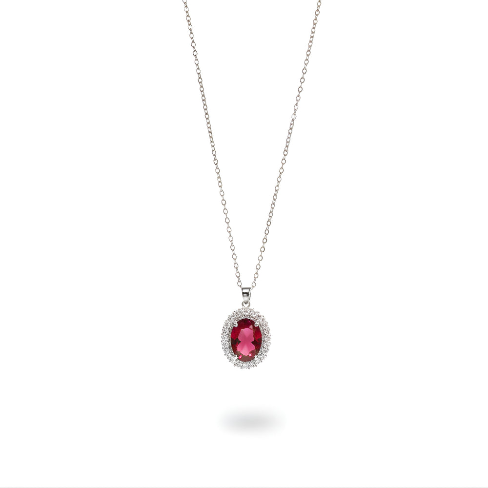 Silver-tone red stone-accent oval pendant necklace on a white background