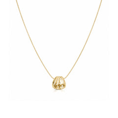 Gold-tone organic pendant necklace with clear stone accents on a white background