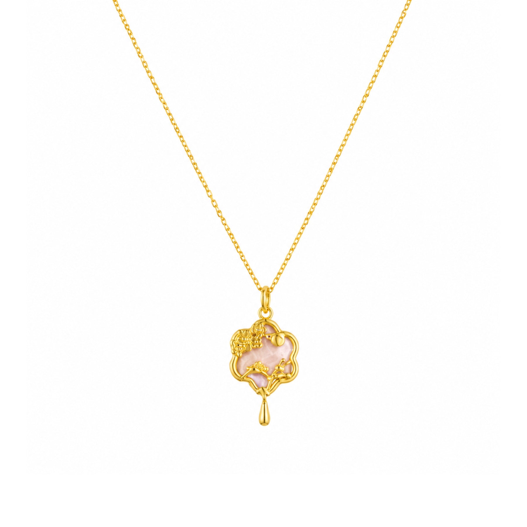 Gold-tone pink floral charm pendant necklace on a white background
